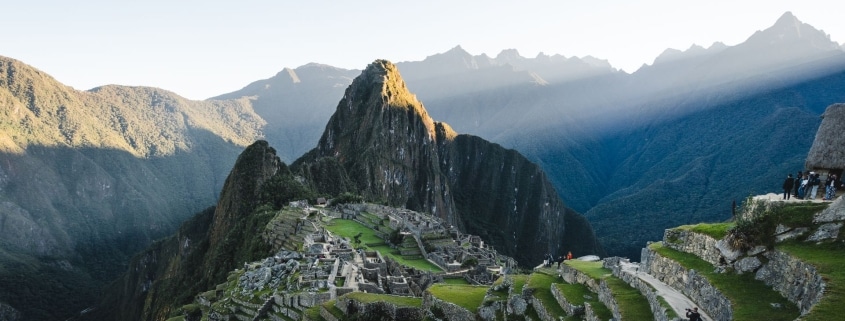 Guests explore ancient ruins while enjoying Machu Picchu tours.