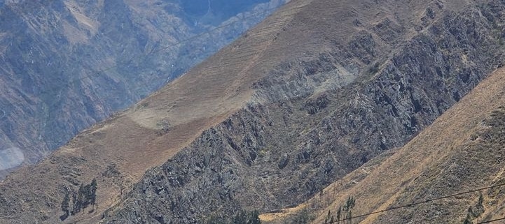 Tourists stroll through beautiful landscapes while enjoying the very best places to visit in Peru.
