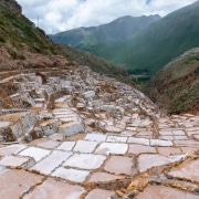 A group of tourists takes in the scenic views while enjoying Peru tours offered by Caravan.