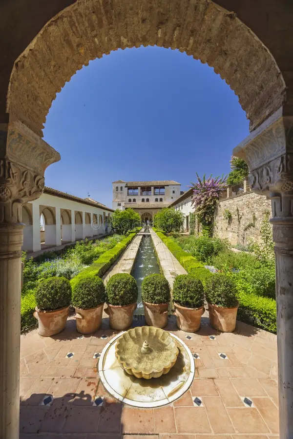 The Generalife gardens with fountains and water channels at the Alhambra in Granada